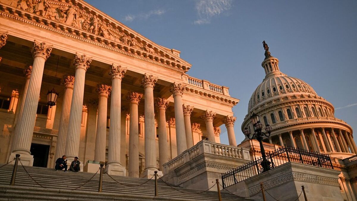 U.S. Rep. Adam Gray (D-CA) and U.S. Rep. Jimmy Gomez (D-CA) sit on the steps of the U.S. Capitol, on the day the House of Representatives votes on U.S. President Donald Trump's sweeping spending and tax bill, in Washington, D.C., U.S., July 3, 2025. REUTERS/Annabelle Gordon