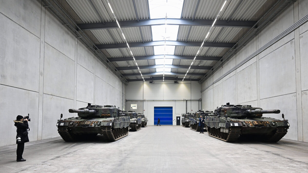A view of Leopard 2 tanks at a production line as German Chancellor Olaf Scholz and Defence Minister Boris Pistorius visit the future site of an arms factory where weapons maker Rheinmetall plans to produce artilleries from 2025, in Unterluess, Germany, Monday Feb. 12, 2024. (Fabian Bimmer/Pool Photo via AP)/LGK114/24043397087907/POOL PHOTO/2402121234