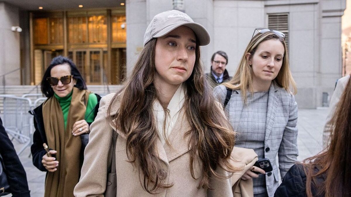 Charlie Javice, founder of Frank, center, exits federal court in New York, US, on Thursday, March 27, 2025. Javice is accused of defrauding JPMorgan Chase & Co. when it acquired her student loan startup for $175 million. Photographer: Yuki Iwamura/Bloomberg