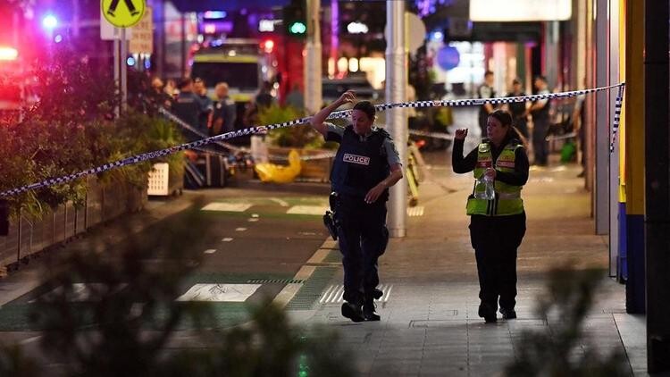 Emergency service workers are seen near Bondi Junction after multiple people were stabbed inside the Westfield Bondi Junction shopping centre in Sydney, April 13, 2024.  AAP Image/Steven Saphore via REUTERS   ATTENTION EDITORS - THIS IMAGE WAS PROVIDED BY A THIRD PARTY. NO RESALES. NO ARCHIVE. AUSTRALIA OUT. NEW ZEALAND OUT. NO COMMERCIAL OR EDITORIAL SALES IN NEW ZEALAND. NO COMMERCIAL OR EDITORIAL SALES IN AUSTRALIA.